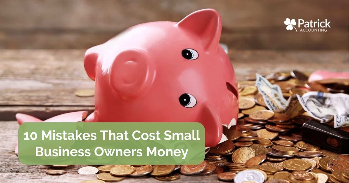 Broken pink piggy bank surrounded by coins and cash, illustrating common financial mistakes that cost small business owners money and impact profitability.