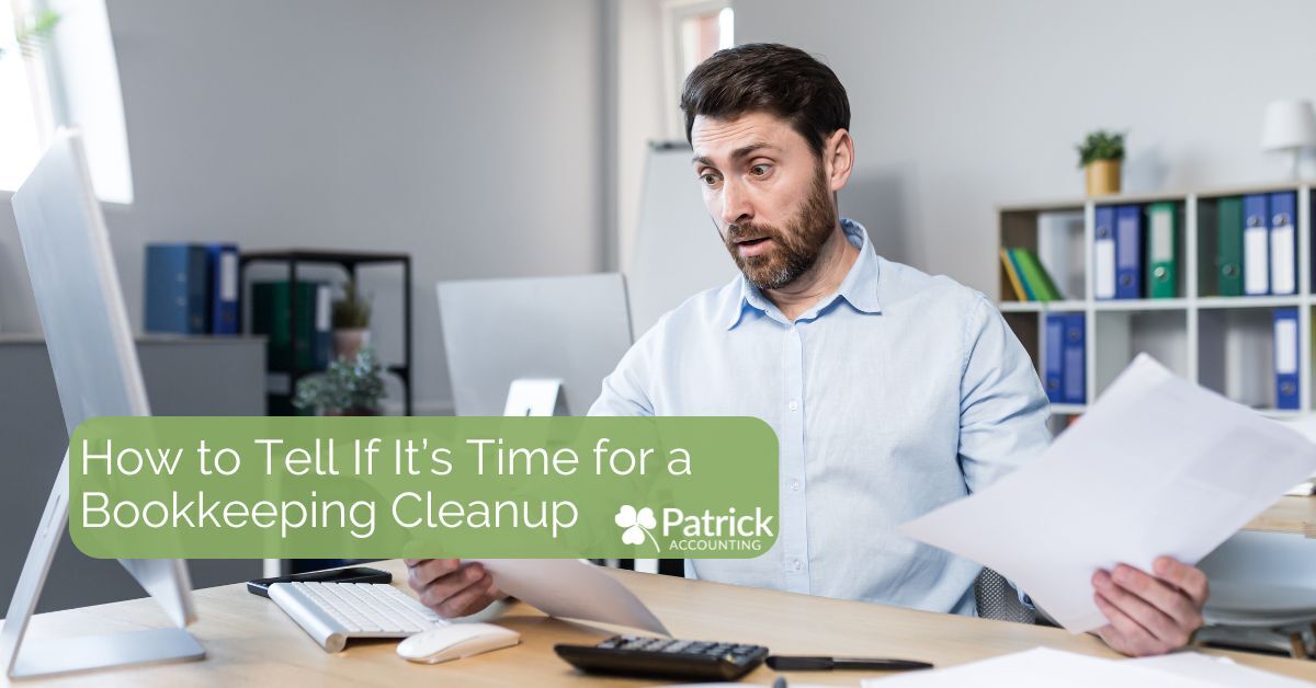 Concerned business owner in a light blue shirt looks at papers while sitting at his desk with a computer and office supplies. Green banner text reads: