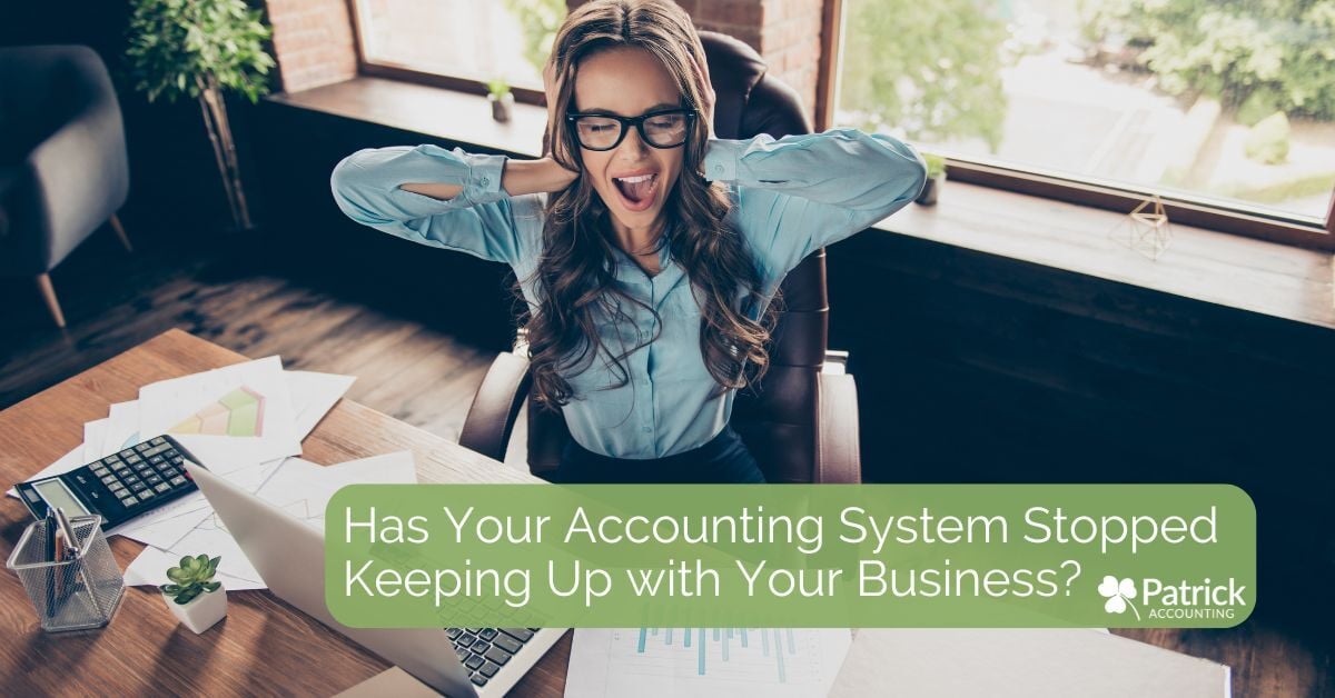Frustrated, business owner at desk with laptop and paperwork. She has her hands to her head and looks like she's screaming. Blog title overlay: 