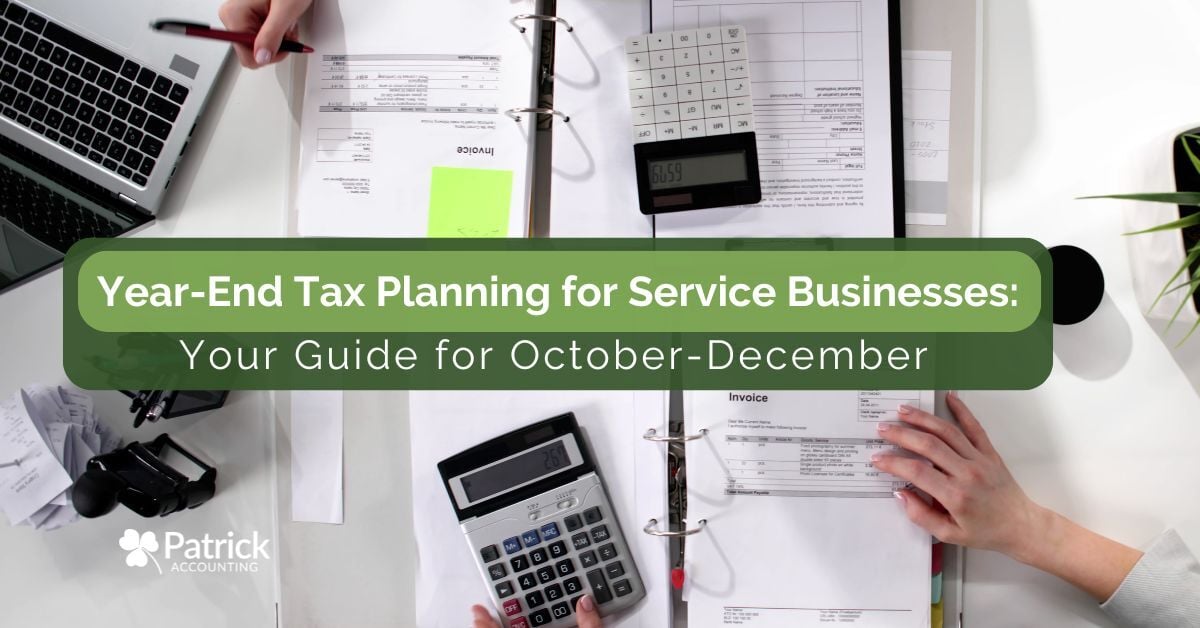 Hands organizing invoices and tax documents on a desk with laptop and calculator. Blog title overlay: