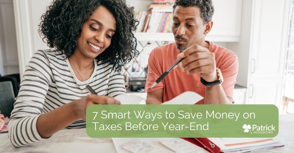 A smiling woman and man sit together at a table looking over documents and holding pens. A green banner on the image reads, 