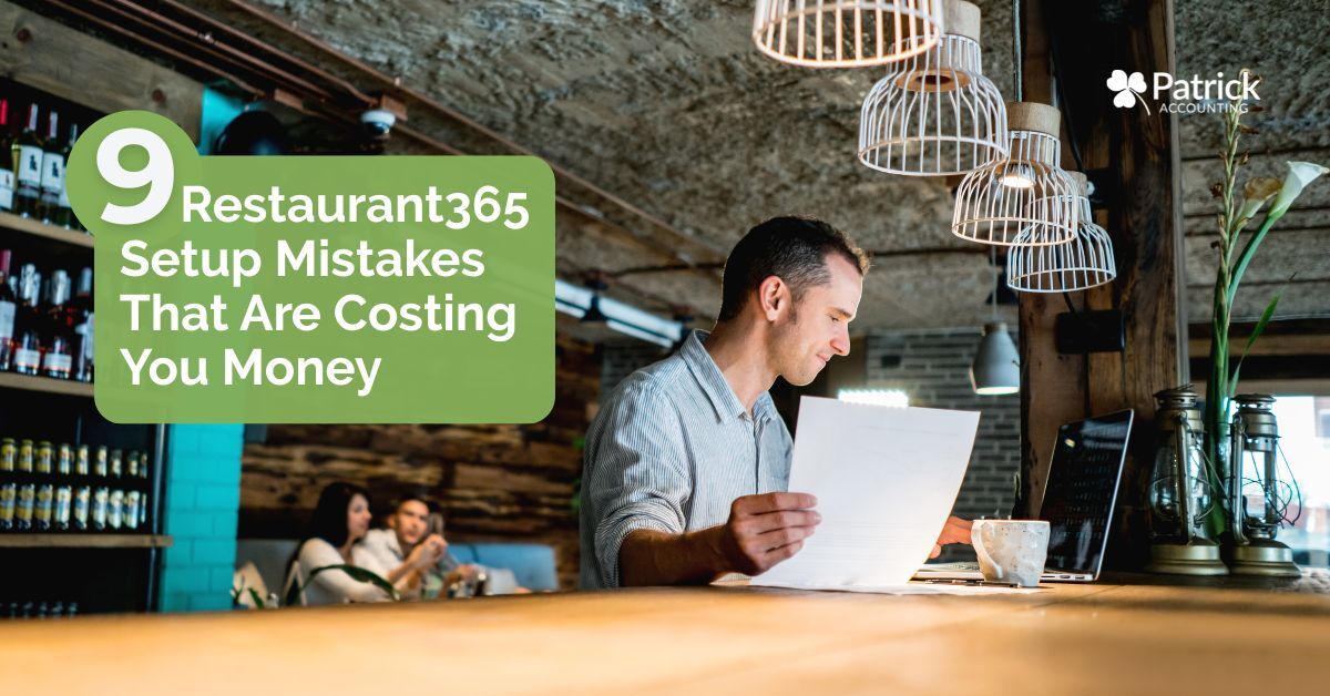 Restaurant owner reviewing reports in a bar, with text reading 