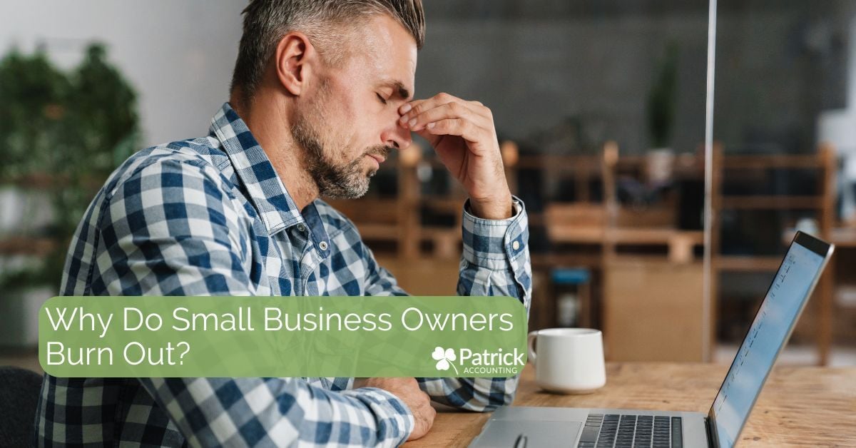 Stressed small business owner sitting at a laptop with head in hand, alongside text