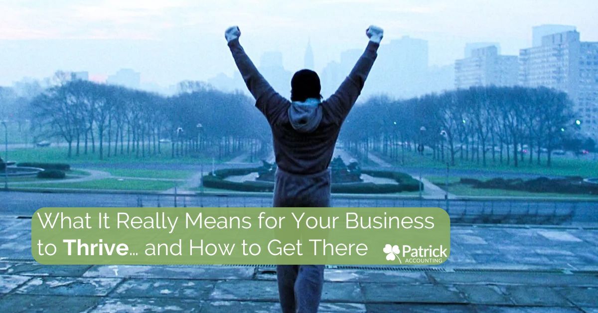Silhouette of a triumphant person with raised arms like Rocky overlooking a city park, with the blog title 