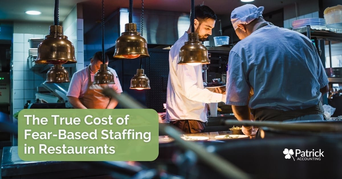 Photo of restaurant kitchen staff working under heat lamps with text reading 