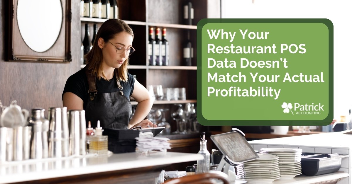 Restaurant owner reviewing point-of-sale data at the counter, highlighting why POS reports don't reflect true profitability.